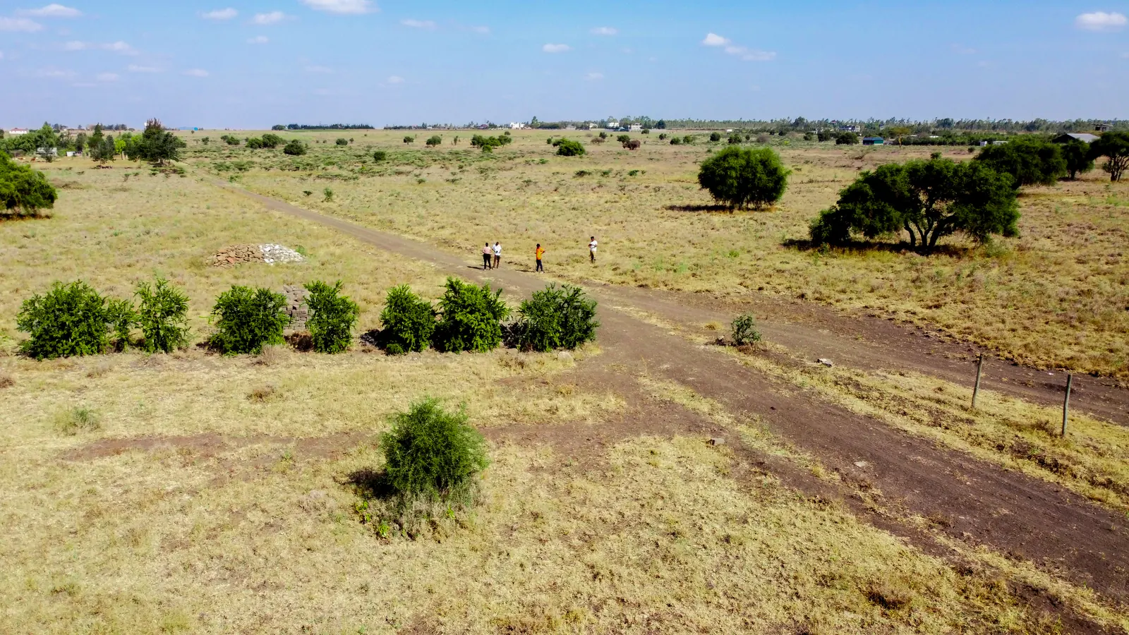 Buyers walking the plots at Goshen Gardens